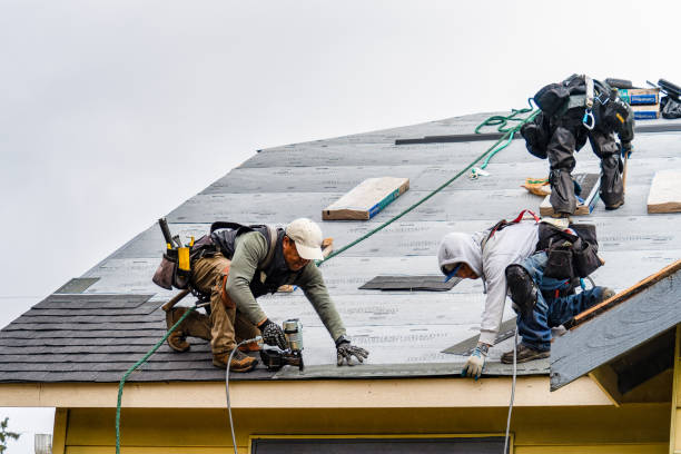 Professional Gutter Installation technician working in Winchester, TN
